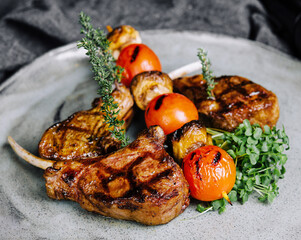 Delicious grilled pork chop on plate