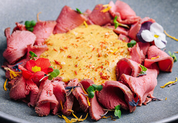 ham in cheese sauce on plate