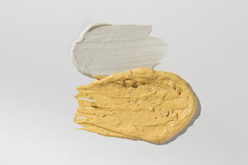 Samples and textures of various cosmetics for skin and hair care. Swatches. Skin care.