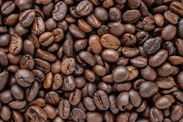 Fresh roasted brown coffee beans background