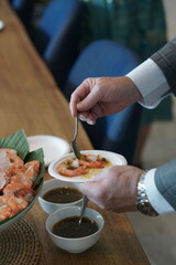 person holding a plate of food