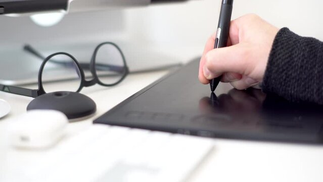 graphic designer working on a tablet