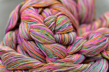 Closeup of colorful braided thread in a knot