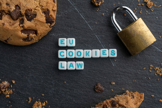 Eu cookies law concept: some die along with a cookie and a lock