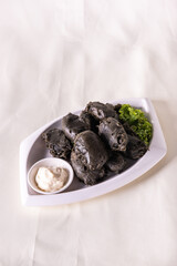 vegan deep fried crispy black charcoal beancurd tofu with salad tartar creamy white sauce vegetable on wood table asian chinese appetiser snack banquet halal food menu for restaurant gourmet buffet, 