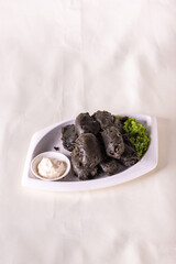 vegan deep fried crispy black charcoal beancurd tofu with salad tartar creamy white sauce vegetable on wood table asian chinese appetiser snack banquet halal food menu for restaurant gourmet buffet, 