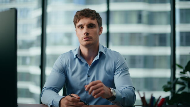 Unfocused office manager sitting closeup. Fatigue ceo thinking about problems