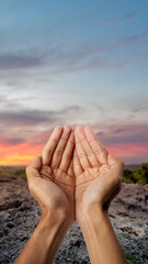 Muslim man raised hands and prayed