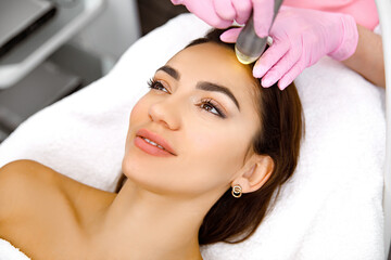Obraz na płótnie Canvas Hydro peel facial,Facial renewal,facial rejuvenation,Dermatological peel,Aqua rejuvenation,Cosmetology service,Facial treatment