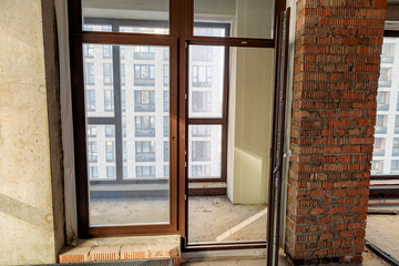 Repair and restoration of apartments. Red brick walls, concrete floors