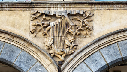 bas-reliefs carved on a facade of Heroes square in Arras, Northern France