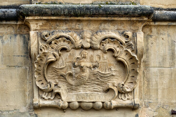 bas-reliefs carved on a facade of Heroes square in Arras, Northern France