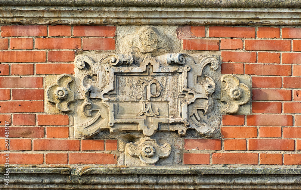 Wall mural bas-reliefs carved on a facade of heroes square in arras, northern france