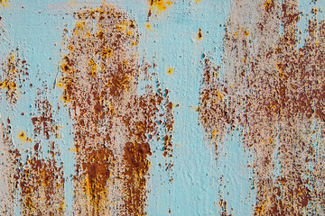 Old cracked paint in craquelure on a rusty metal surface Grunge rusted metal texture. Rusty corrosion and oxidized background. Worn metallic iron rusty metal background