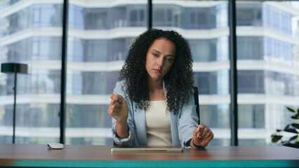 Woman analysing holographic data operating digital animation in office close up.