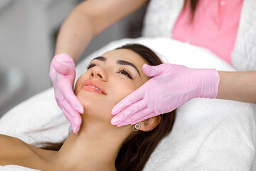 Obraz na płótnie Canvas Facial acupuncture,Cosmetology service,cosmetic facial procedure, Acne therapy