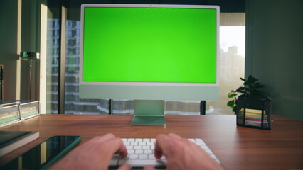 Closeup unknown man typing chromakey computer. Boss arms working green screen pc