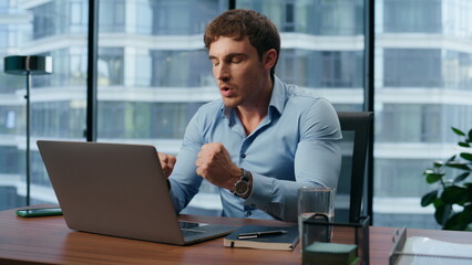 Angry director meditating in yoga pose office. Furious man trying concentrate