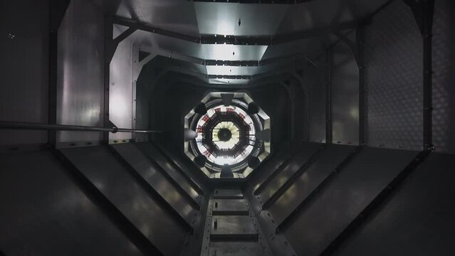 Empty grain dryer metal funnel with rotating fan upper view. Crop wheat and rye cereals processing equipment. Granary improvement and farm industry