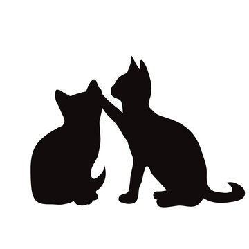 Vector silhouette of couple of cats on white backgroud.