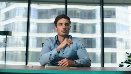 Businessman using holographic interface application for analysing data close up.