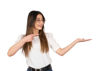 Transparent png, smiling happy young girl pointing finger.  Standing over isolated white background. Showing at open palm. Studio shot.  Copy space. Holding imaginary object, advertising concept idea.
