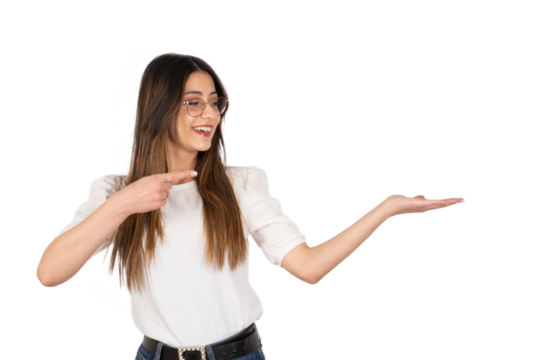 Transparent png, smiling happy young girl pointing finger.  Standing over isolated white background. Showing at open palm. Studio shot.  Copy space. Holding imaginary object, advertising concept idea.