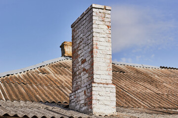 Brick chimney and slate roof