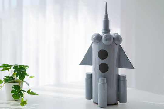 Step-by-step instructions for making crafts from improvised materials. Handmade at school craft rocket for the day of cosmonautics. Step 21