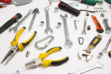 Set of tools for repair in a case on a white background. Assorted work or construction tools. Wrenches, Pliers, screwdriver. Top view