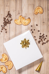 White box mockup between different sweets on the table and figures