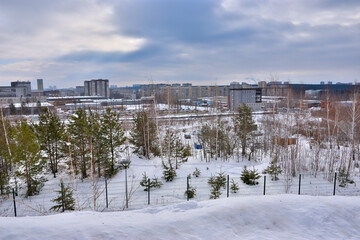 Fototapeta na wymiar A fragment of the urban landscape on a winter day