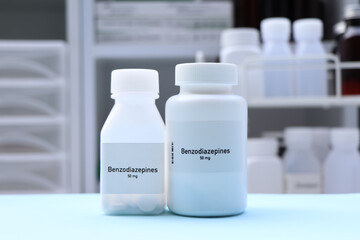 Benzodiazepines pill in white bottle, pill stock