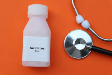 Naltrexone pill in white bottle, pill stock