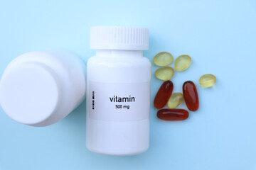 vitamin pill in white bottle, pill stock