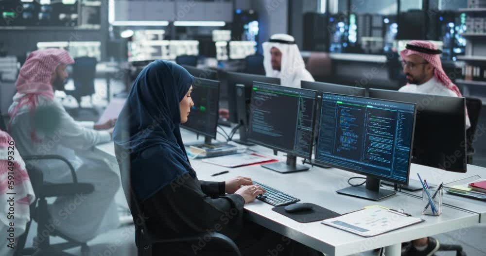 Leinwandbilder Group of Multicultural Middle Eastern Men and Women Working in Research Center, Collaborating on an Online Project, Using Computers to Write Software Code, Develop Artificial Intelligence Service