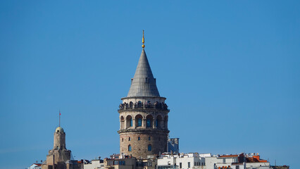 Istanbul city skyline in Turkey, Beyoglu district old houses with Galata tower on top, view from the Golden Horn in Emin&ouml;n&uuml; side.