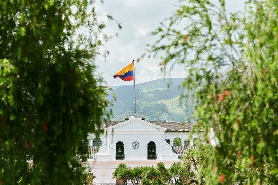 National flag waving on government Palacio de Carondelet