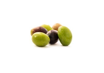 Fresh olives isolated on white background. Olives on white background. Green and red olives close up.