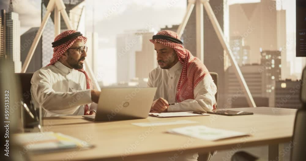 Poster arab financial analyst having a meeting to discuss a project with a team leader. middle eastern coll