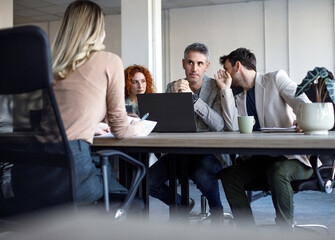 Obraz premium Human resource team having a job interview with their candidate.