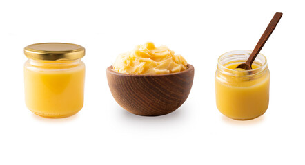 Clarified butter in jar and in wooden bowl, cooking oil, pure ghee isolated on white background. Clarified butter with copy space for text on white. Ghee butter in a bowl from different angles.