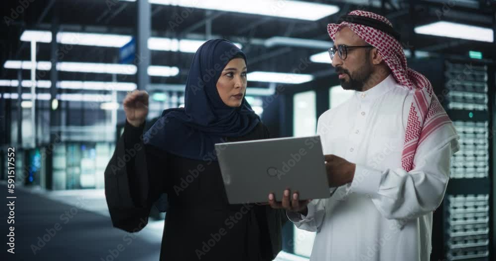 Poster middle eastern network engineer and cybersecurity specialist work in server facility. muslim female 