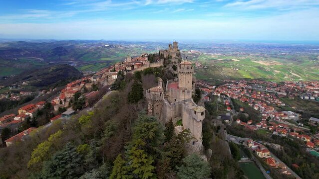  San Marino aerial drone overflight video of medieval town and two castles. Italy travel and landmarks