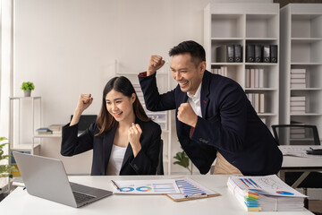 The couple of business talking about the project  and make deal in the office.