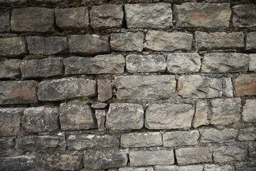 Traditional old dry stone wall constructed without mortar or cement