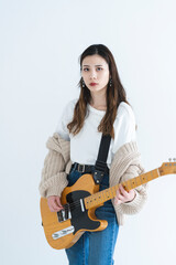 Fototapeta premium ギターを弾く女性