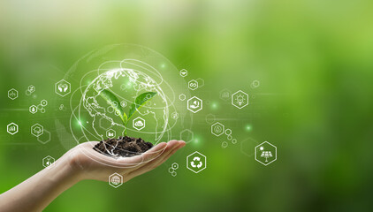 Environmental technology concept. Sustainable development goals. SDGs.hand holding young plant with reduce pollution ESG icon on a green. eco earth day.environmental saving, CSR, ESG awareness.