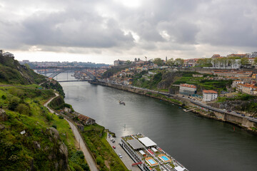 Panoramic view of Douro river and D. Luis I Bridge in Portugal.