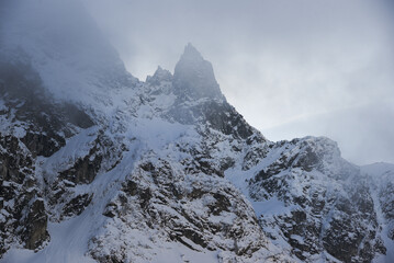 Obraz premium Winter mountain landscape. Polish Tatras in winter in the area of ​​